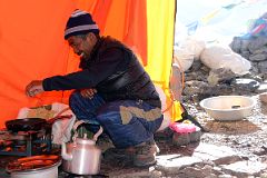 29 Climbing Sherpa Lal Singh Tamang Preparing Breakfast In The Kitchen Tent At Mount Everest North Face Advanced Base Camp 6400m In Tibet